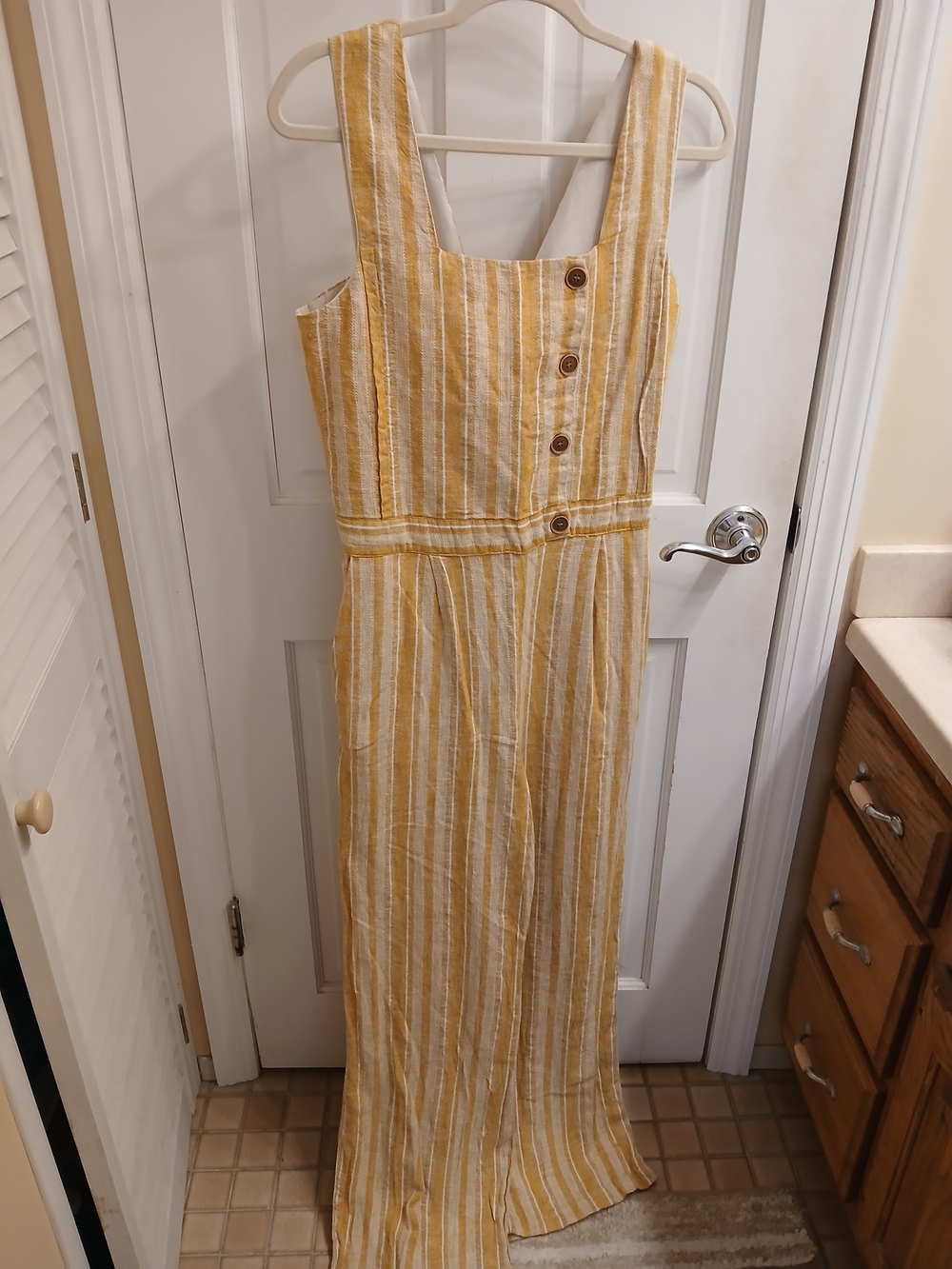Indigo Rein Yellow and White Striped Sleeveless Jumpsuit